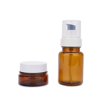 OEM PETG অ্যাম্বার প্লাস্টিক পাম্প বোতল 40ml 60ml 100ml 130ml
